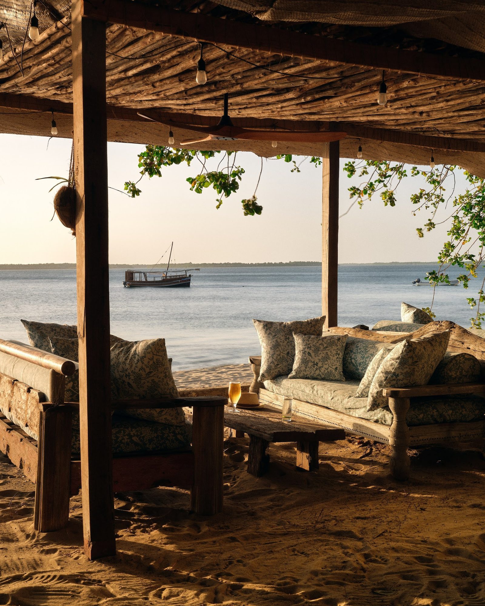 Kilindini under full sail at sunset off the Lamu coast