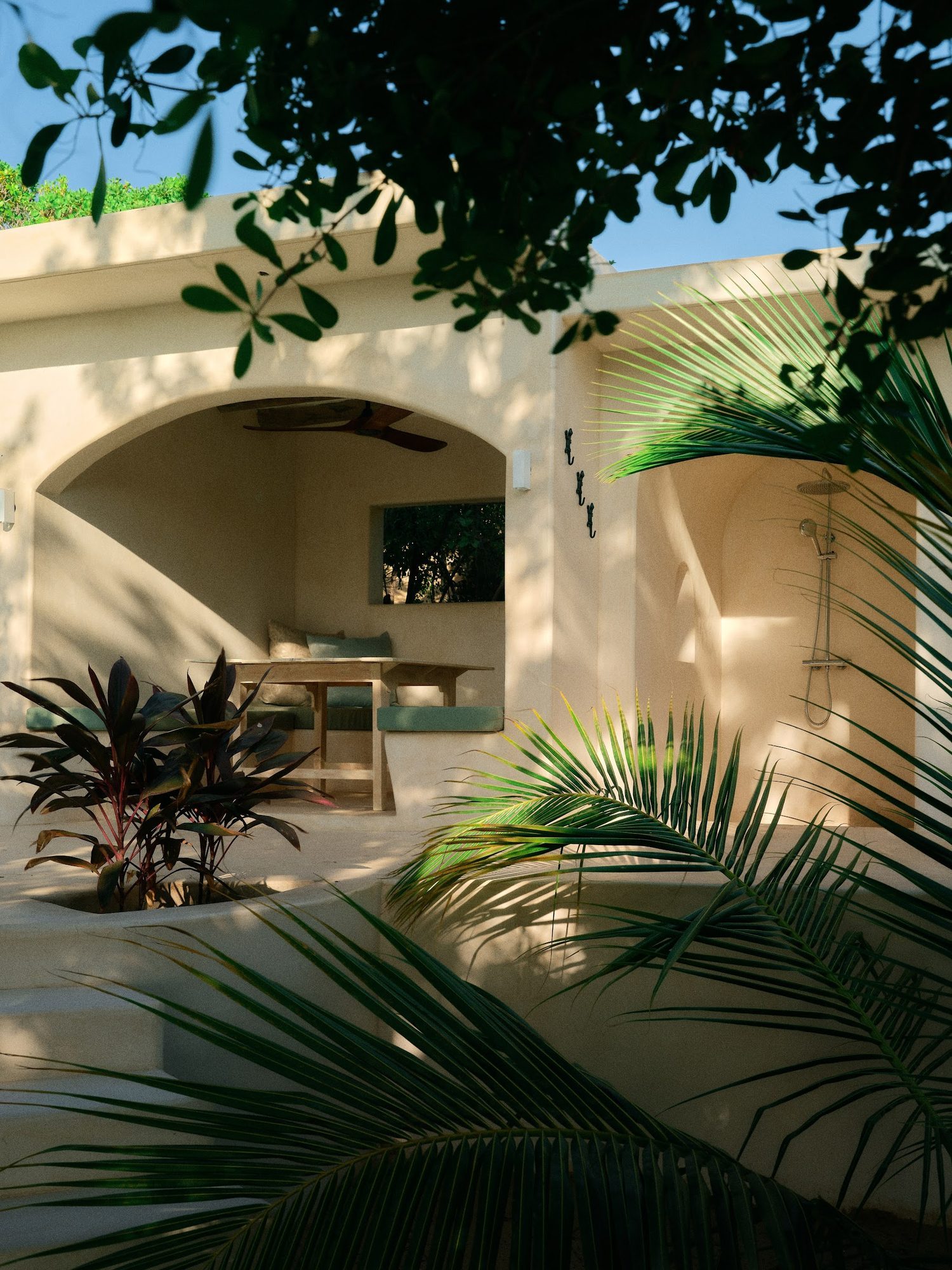 A reading corner in the late afternoon light at The Cabanas Lamu