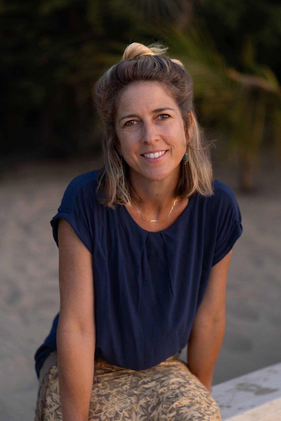 Anna, founder of The Cabanas Lamu, portrait at golden hour on the beach
