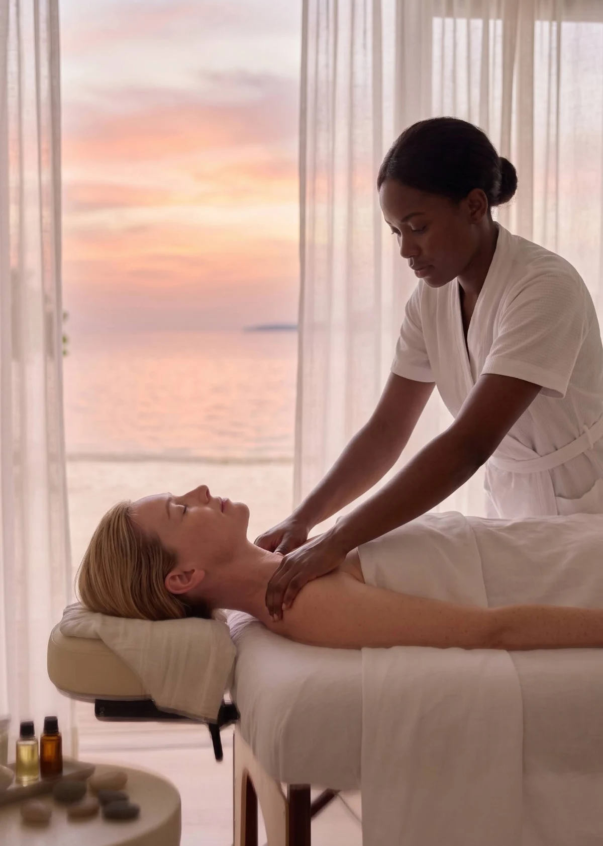 A shoulder massage at sunset in the Zen Den