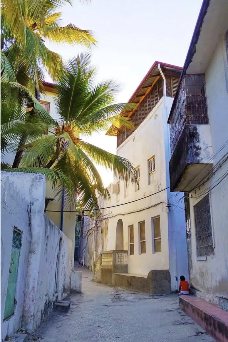 A quiet coral-stone street in Lamu Old Town, a UNESCO World Heritage Site